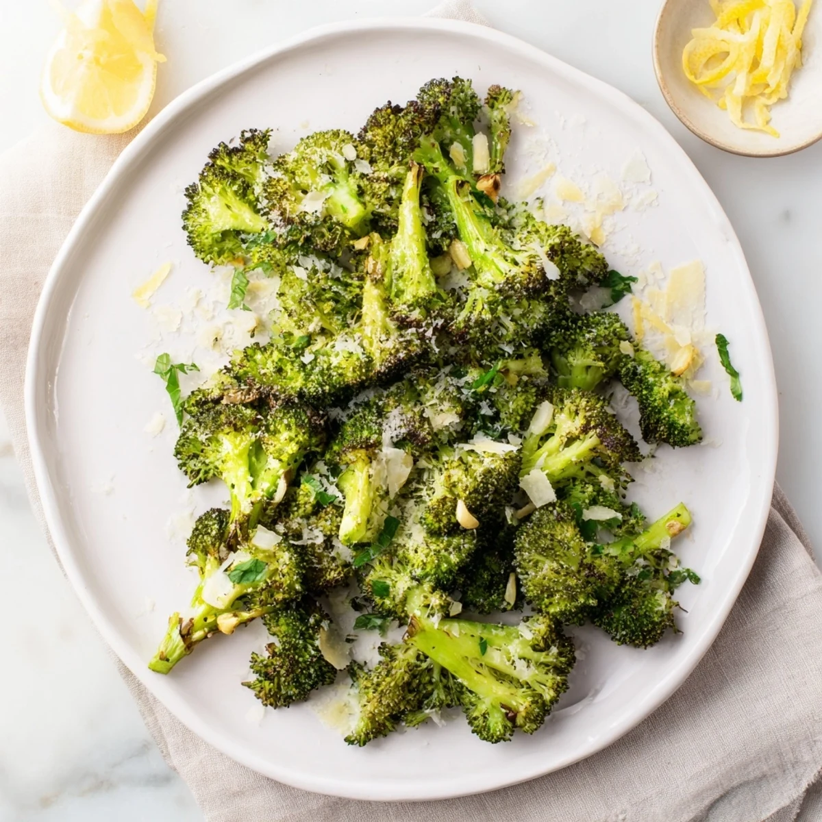 A close-up view of the delicious Simple Garlic and Parmesan Roasted Broccoli with garlic aroma.