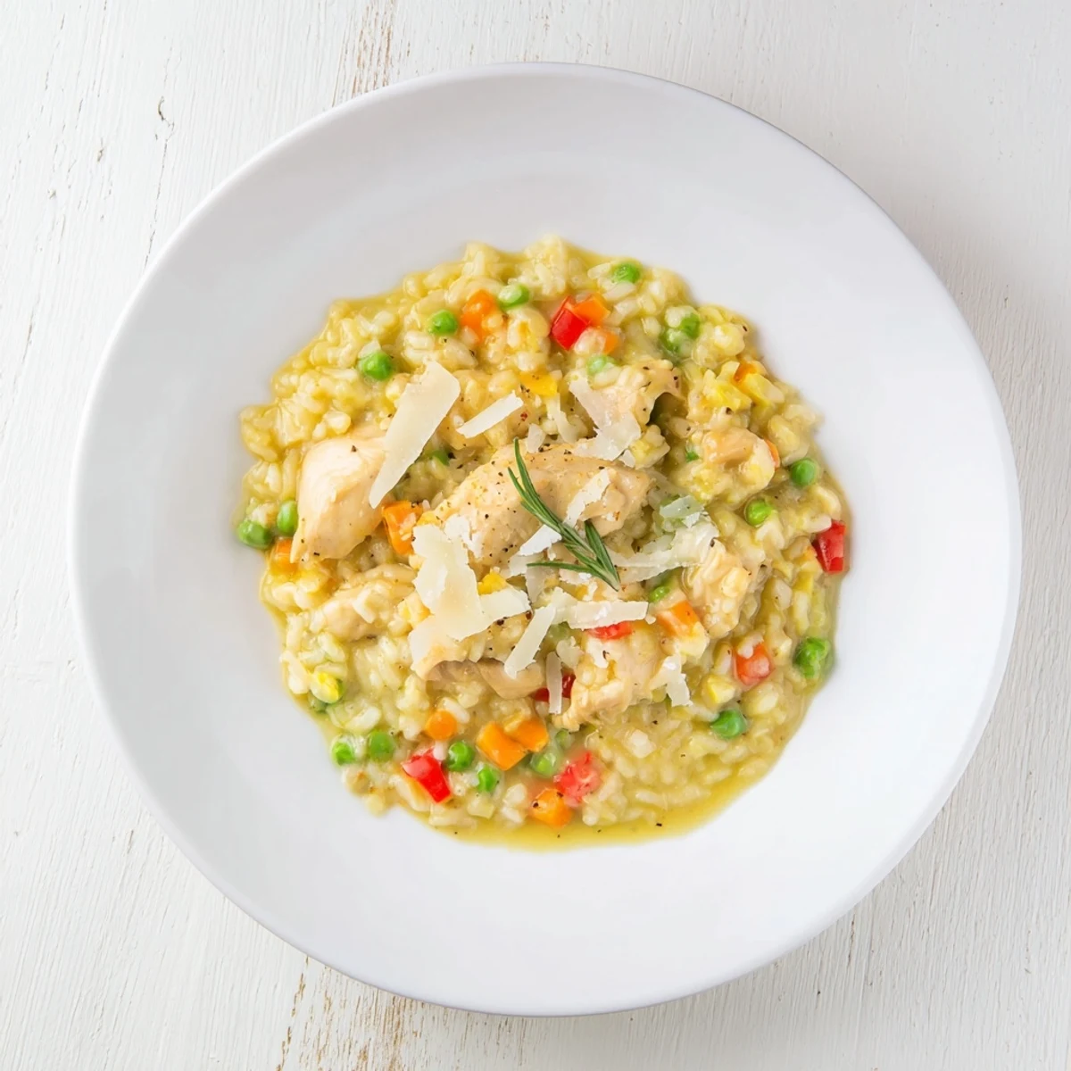 Golden chicken thighs atop creamy wild rice in the skillet create this enticing All-in-One Pan Creamy Chicken Wild Rice.