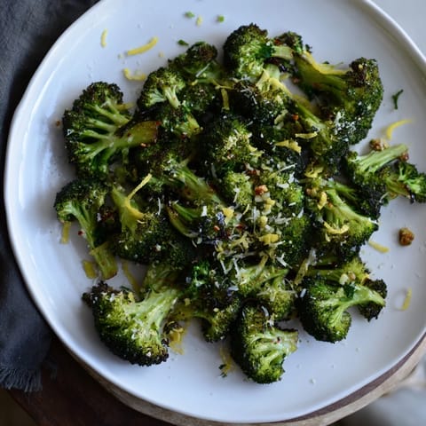 Savory, oven-roasted Simple Garlic and Parmesan Roasted Broccoli, ready to be served as a flavorful side.