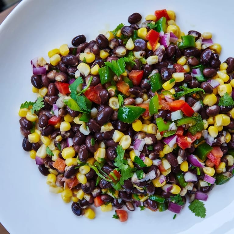 Close up shot of fresh Cowboy Caviar Salad, showcasing the bright colors and textures.